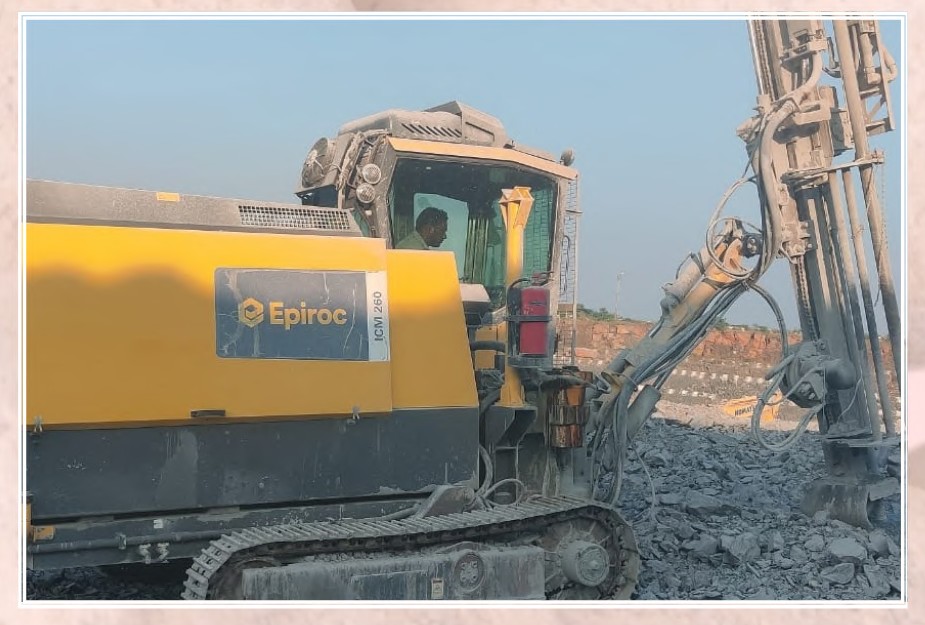 Drilling machine operating at a mine