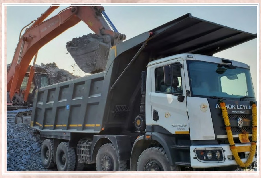 Tipper truck moving material